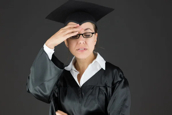 Student ashamed hiding face in hand — Stock Photo, Image