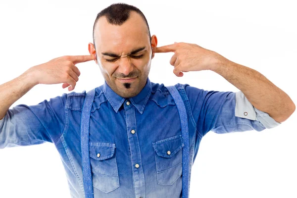 Model plugging ears with fingers — Stock Photo, Image