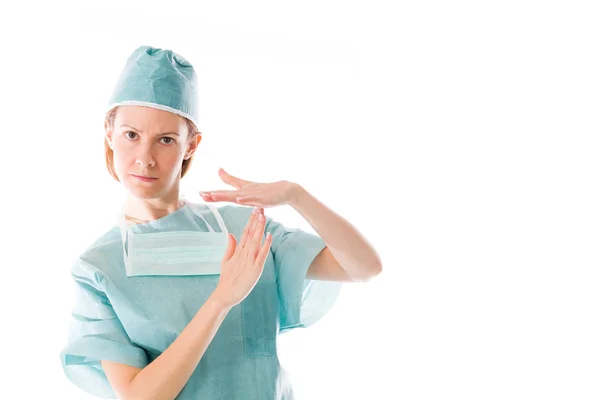 Femmina medico gesticolare segno di pausa — Foto Stock