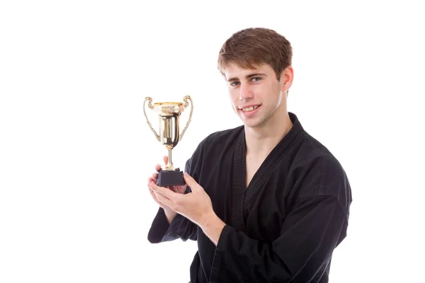 Modelo segurando um troféu — Fotografia de Stock