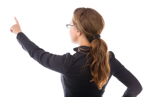 Mujer de negocios apuntando hacia atrás — Foto de Stock