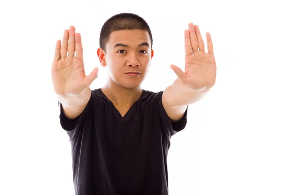 Model gesturing  stop sign with hands — Stock Photo, Image