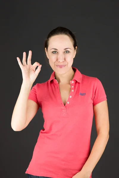 Model gesturing ok hand sign — Stock Photo, Image