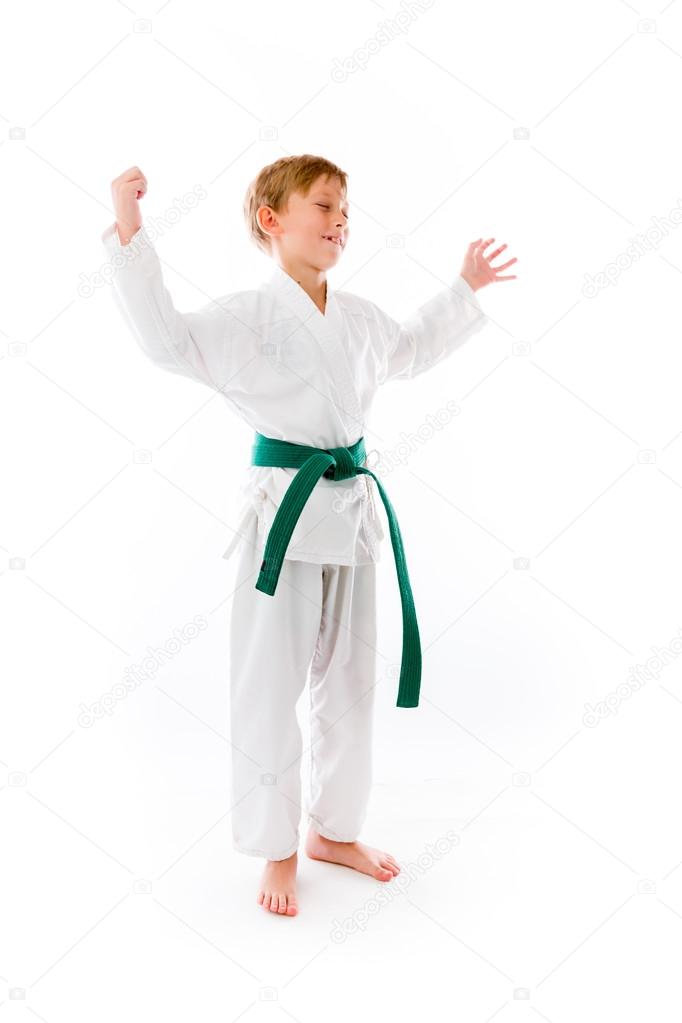 Boy screaming with fists up