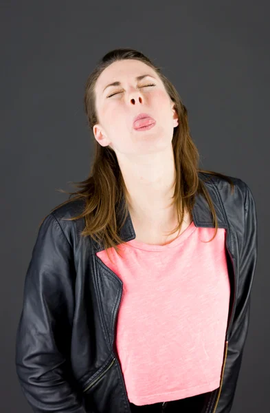Model sticking tongue out — Stock Photo, Image