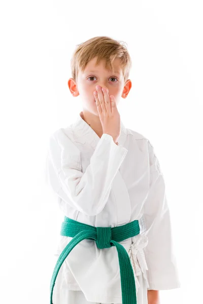 Boy covering his mouth with hand — Stock Photo, Image