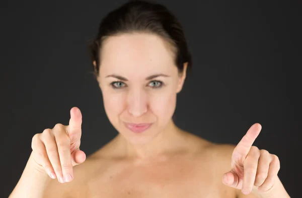 Model with fingers pointing to camera — Stock Photo, Image