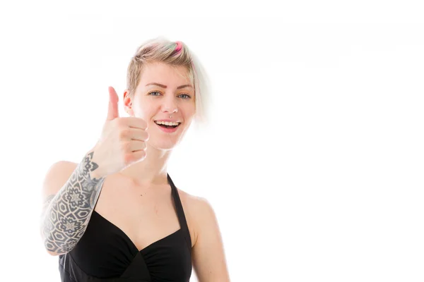 Vrouw gebaren duim omhoog teken — Stockfoto