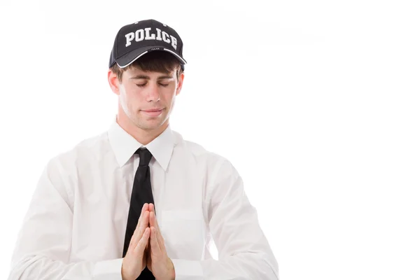 Polizist betet und wünscht — Stockfoto