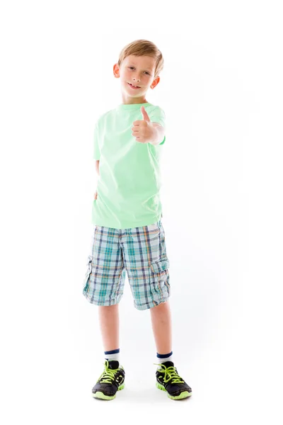 Boy gesturing thumb up sign — Stock Photo, Image