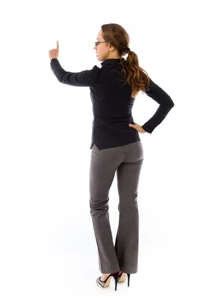 Mujer de negocios apuntando hacia atrás — Foto de Stock