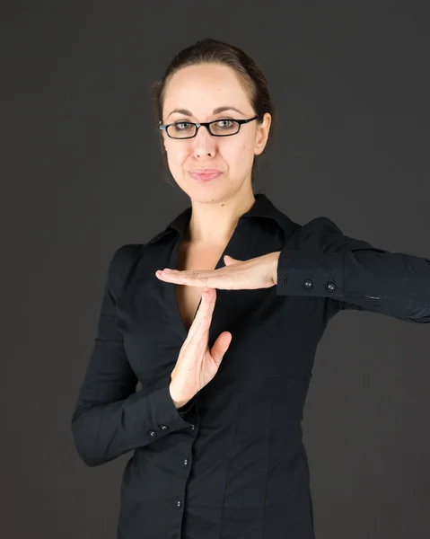 Businesswoman gesturing break sign — Stock Photo, Image