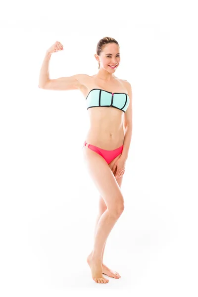 Strong model with arm curl — Stock Photo, Image