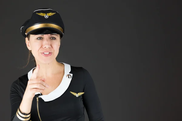 Stewardess schimpft mit dem Finger — Stockfoto
