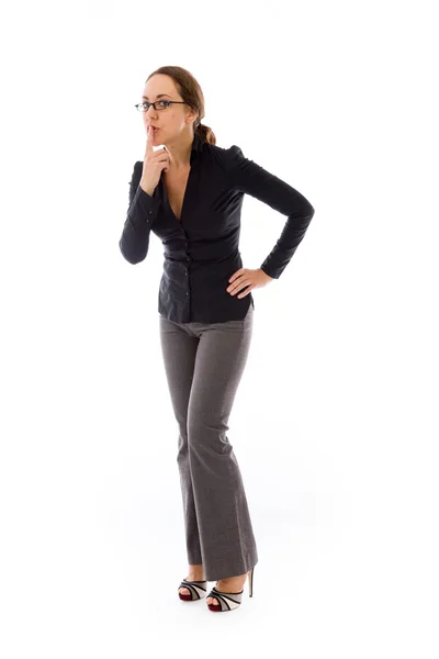 Businesswoman with finger on lips — Stock Photo, Image