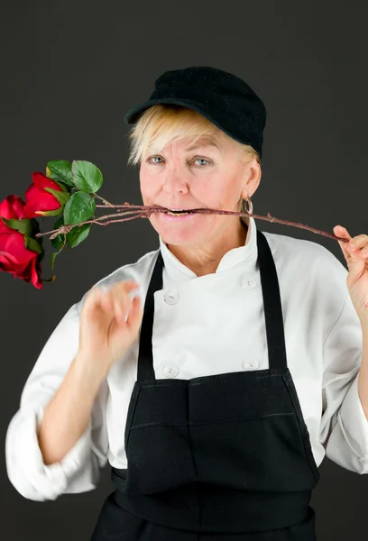 Model with rose in mouth — Stock Photo, Image
