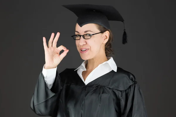 Student gesturing ok hand sign — Stock Photo, Image