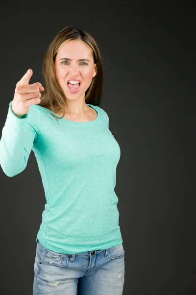 Model nörgelt mit dem Finger — Stockfoto