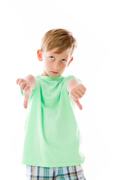 Boy showing thumbs down — Stock Photo, Image