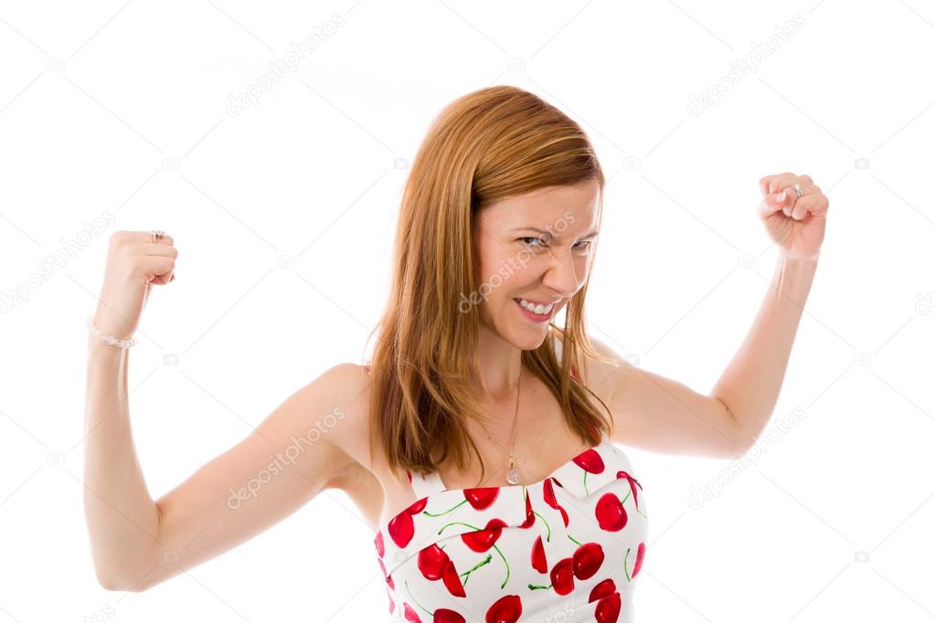 Woman screaming with fists up