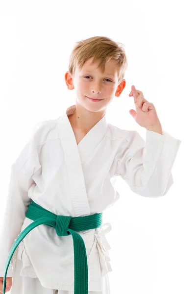 Boy with fingers crossed for luck — Stock Photo, Image