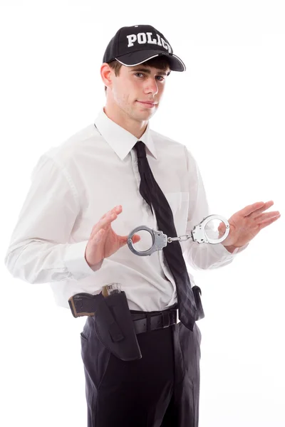 Policeman holding handcuffs — Stock Photo, Image