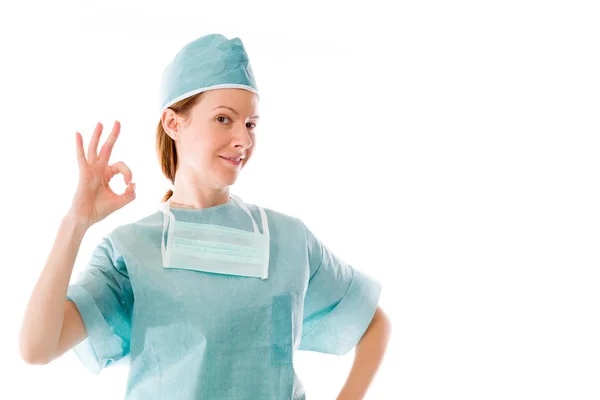 Female doctor gesturing ok hand sign — Stock Photo, Image