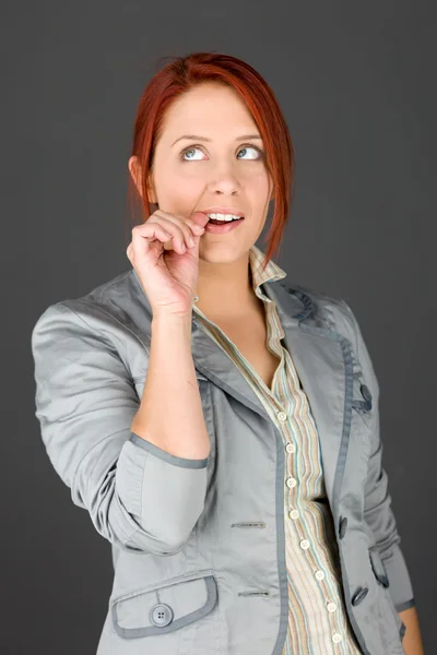 Nervous model biting finger nails — Stock Photo, Image