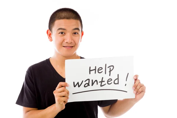 Model holding help wanted  sign — Stock Photo, Image