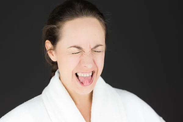 Model tong uitsteekt — Stockfoto