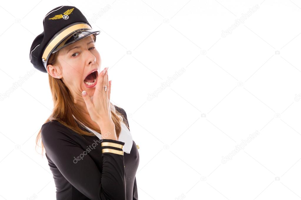 Air hostess bored and yawning