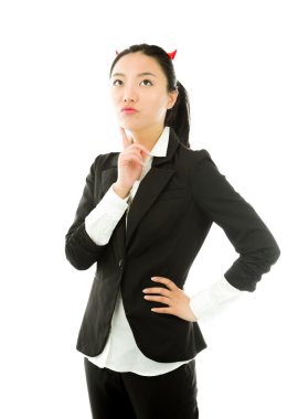 Devil side of a young Asian businesswoman thinking with finger on chin isolated on white background