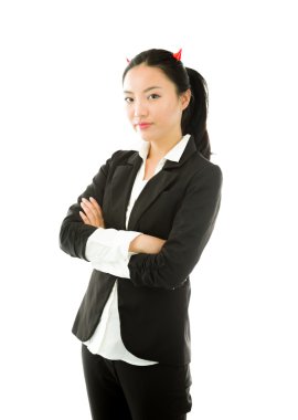 Devil side of a young Asian businesswoman standing with her arms crossed isolated on white background clipart
