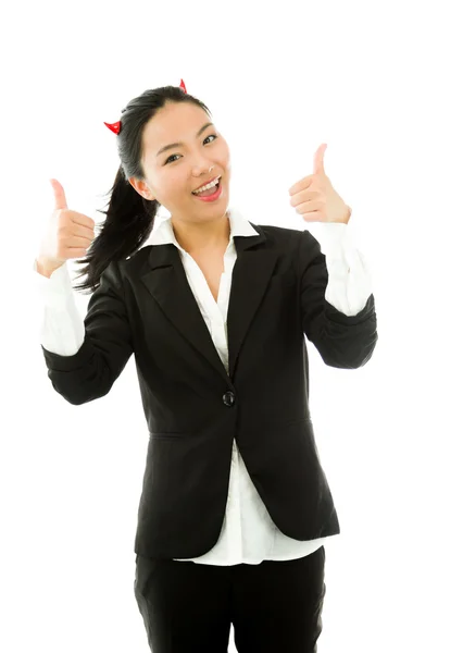 Diabo lado de uma jovem mulher de negócios asiática mostrando polegar para cima sinal com ambas as mãos e sorrindo isolado no fundo branco — Fotografia de Stock
