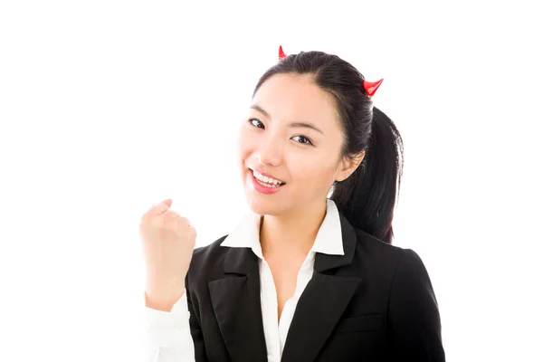 Lato diabolico di una giovane imprenditrice asiatica che celebra il successo con un pugno isolato su sfondo bianco — Foto Stock