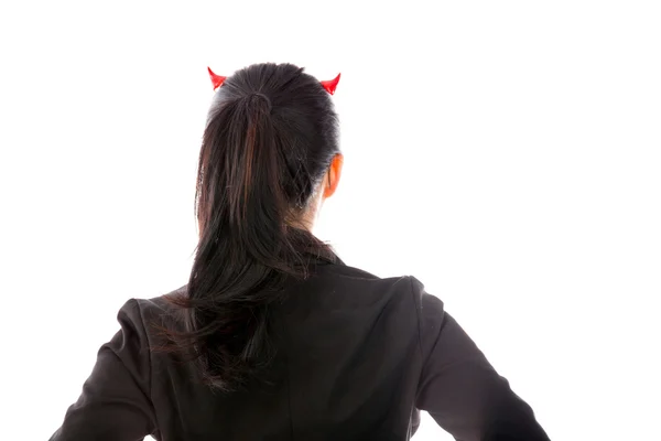 Rear view of devil side of a young Asian businesswoman isolated on white background — Stok fotoğraf