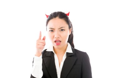 Devil side of a young Asian businesswoman scolding somebody isolated on white background