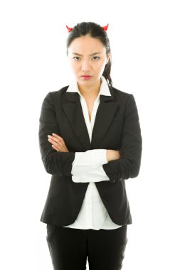 Devil side of a young Asian businesswoman standing with her arms crossed and looking sad isolated on white background