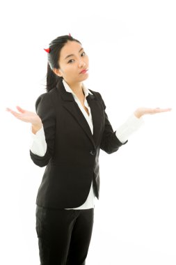 Devil side of a young Asian businesswoman shrugging isolated on white background