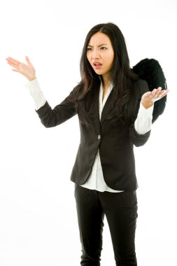 Asian young businesswoman dressed up as black angel dont know what to do isolated on white background