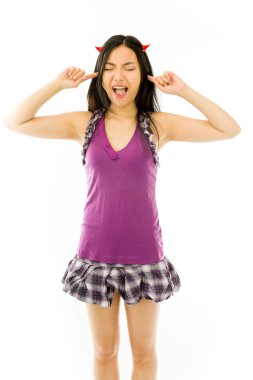 Asian young woman dressed up as a devil  and shouting in frustration isolated on white background