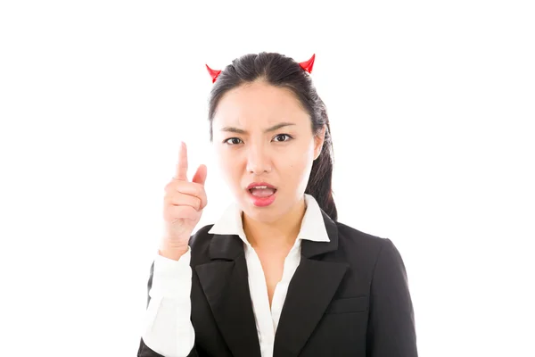 Devil side of a young Asian businesswoman scolding somebody isolated on white background — Stok fotoğraf