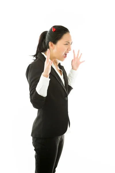 Devil side of a young Asian businesswoman shouting and gesturing isolated on white background — Stockfoto