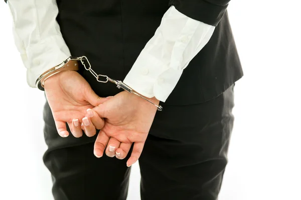 Mid section of a Asian young businesswoman dressed up as an angel handcuffs isolated on white background — Stock Fotó