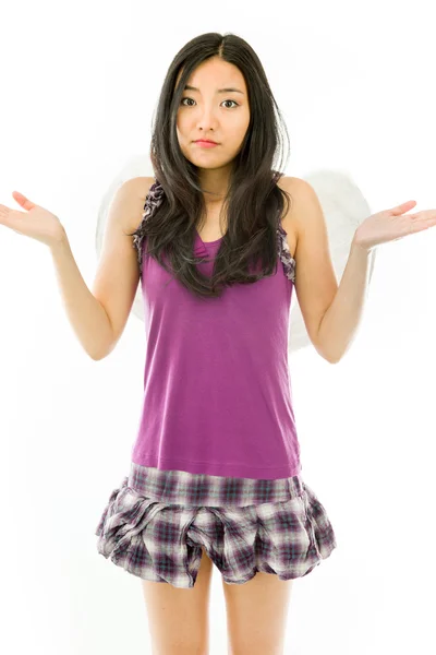 Asian young woman dressed up as an angel with shrugging expression isolated on white background — Stock Photo, Image