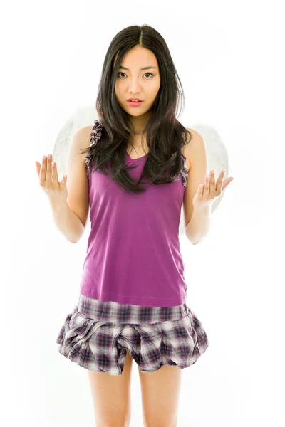Asiático jovem mulher vestida como um anjo gesticulando isolado no fundo branco — Fotografia de Stock