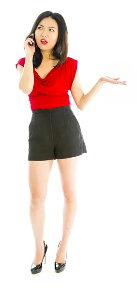 Young woman talking on mobile phone — Stock Photo, Image