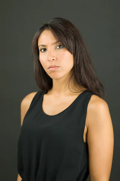 Portrait of a young  woman looking serious — Stock Photo, Image