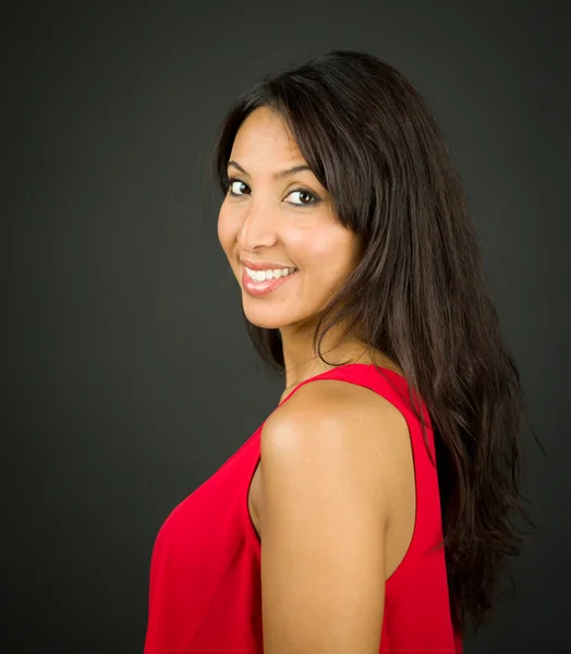 Side profile of a young woman smiling — Stock Photo, Image