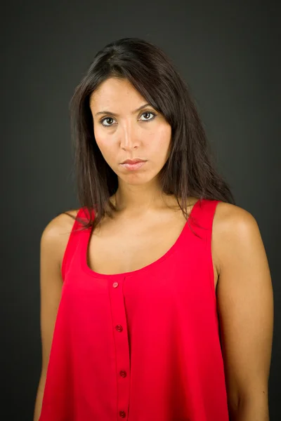 Portrait of a serious young woman — Stock Photo, Image